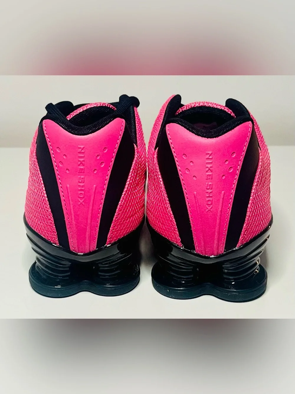 Nike Women’s Shox Pink Running Sneakers with Black Accents